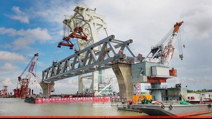 Padma Bridge becomes visible with the installation of the first span at the Jajira point in Shariatpur