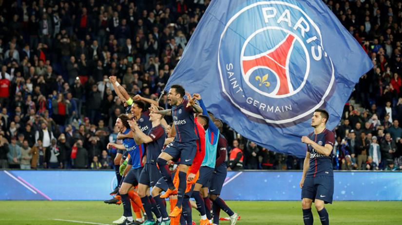 Paris Saint-Germain players celebrate after the match after winning Ligue 1 (Photo: REUTERS)