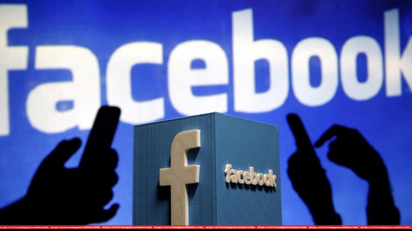 A 3D plastic representation of the Facebook logo is seen in this photo illustration May 13, 2015. REUTERS