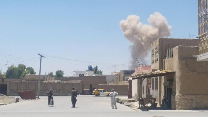 A cloud of smoke is seen after an explosion in Kandahar, Afghanistan May 22, 2018 in this picture obtained from social media. Reuters/file photo