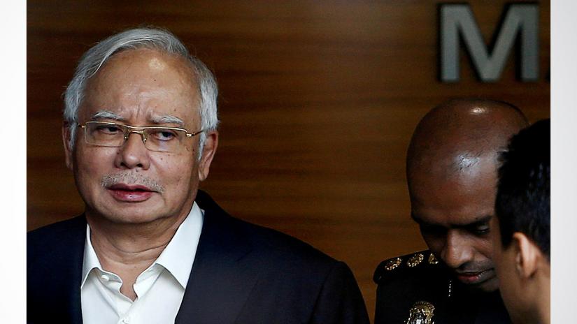 Malaysia`s former prime minister Najib Razak arrives to give a statement to the Malaysian Anti-Corruption Commission (MACC) in Putrajaya, Malaysia, May 24, 2018. REUTERS
