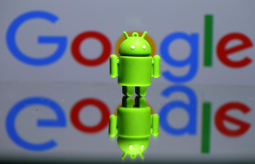 A 3D printed Android mascot Bugdroid is seen in front of a Google logo in this illustration taken July 9, 2017. REUTERS