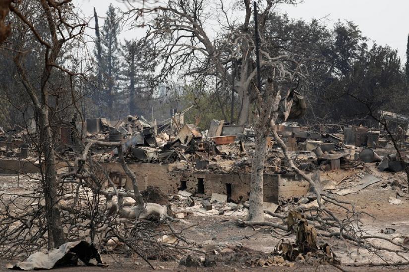 A charred neighborhood destroyed by the Carr Fire is seen west of Redding, California, U.S. July 27, 2018. REUTERS