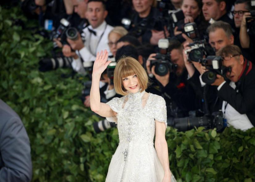 FILE PHOTO: Vogue Editor-in-Chief Anna Wintour arrives at the Metropolitan Museum of Art Costume Institute Gala (Met Gala) to celebrate the opening of `Heavenly Bodies: Fashion and the Catholic Imagination` in the Manhattan borough of New York, U.S., May 7, 2018. REUTER