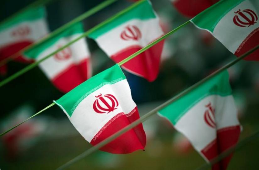 Iran`s national flags are seen on a square in Tehran February 10, 2012. REUTERS/File Photo