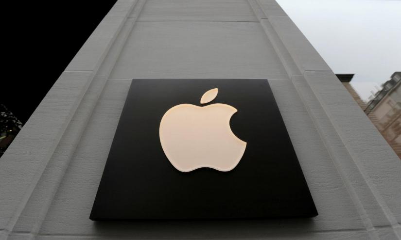 The company`s logo is seen outside Austria`s first Apple store, which opens on February 24, during a media preview in Vienna, Austria, February 22, 2018. REUTERS/FILE PHOTO