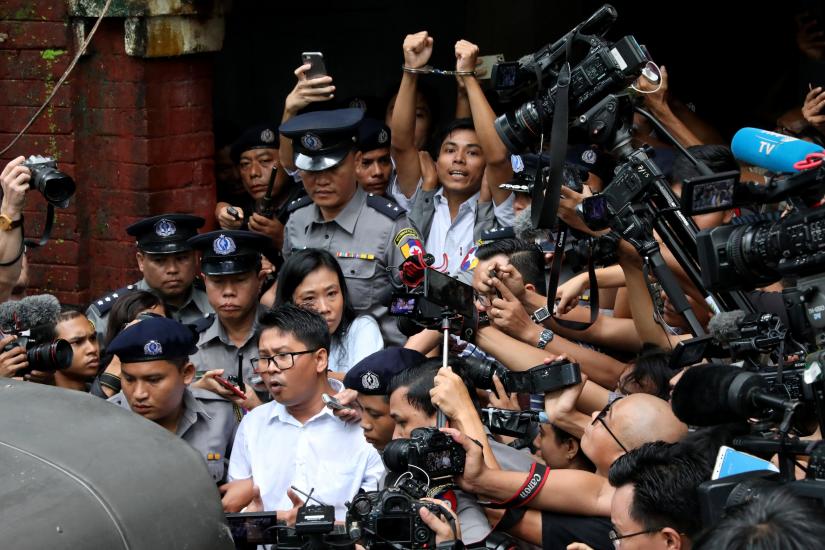 Detained Reuters journalists Wa Lone and Kyaw Soe Oo leave Insein court after listening to the verdict in Yangon, Myanmar September 3, 2018. REUTERS