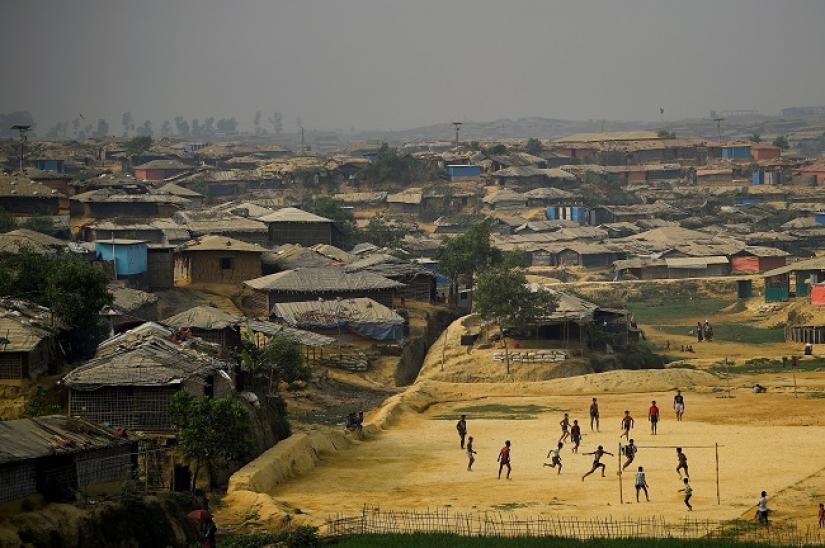 Rohingya refugees play football at Kutupalong refugee camp in Cox`s Bazaar, Bangladesh, March 27, 2018. REUTERS