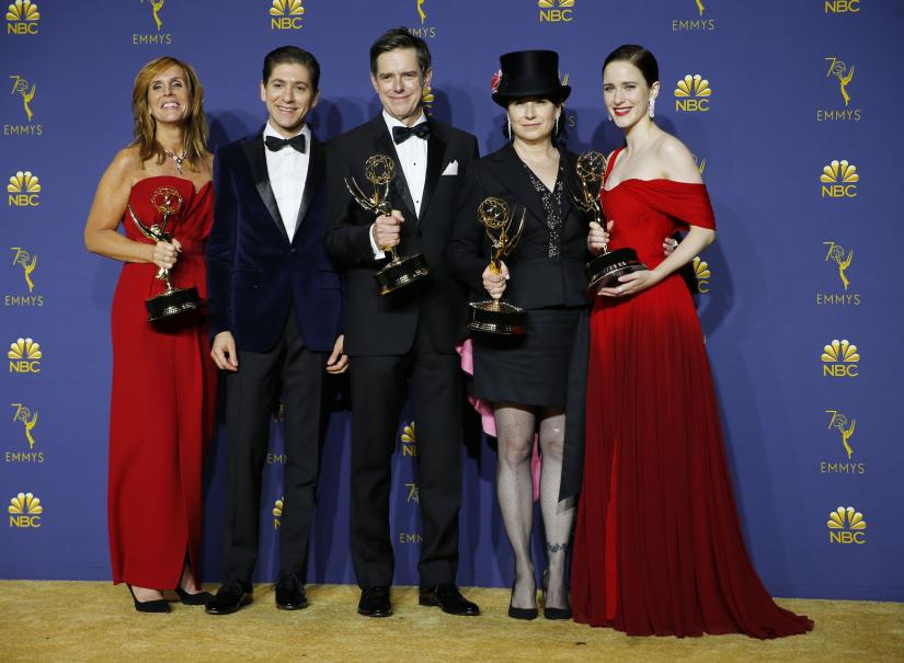 70th Primetime Emmy Awards - Photo Room - Los Angeles, California, U.S., 17/09/2018 - The cast poses backstage with their Outstanding Comedy Series award for `The Marvelous Mrs. Maisel.` REUTERS