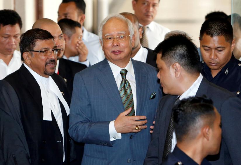 This August 2018 photo shows Malaysia`s former prime minister Najib Razak walking out of a courtroom in Kuala Lumpur, Malaysia. REUTERS
