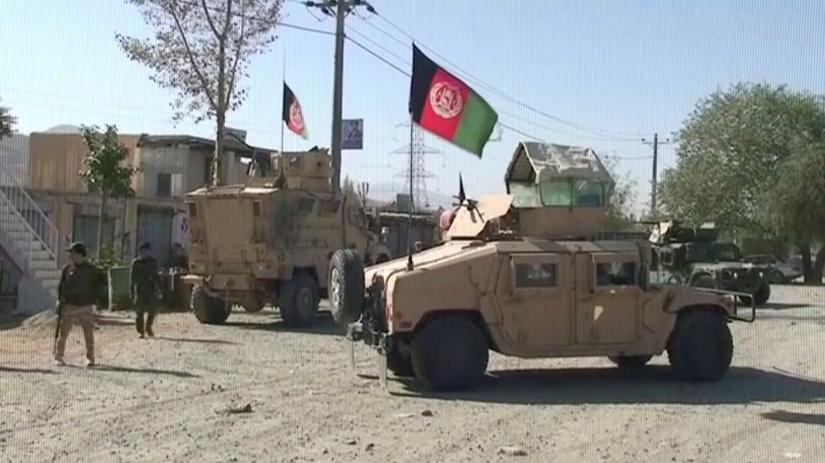 Security Humvees gather near a site attacked by Taliban in Wardak Province, Afghanistan, in this still image taken from video on October 7, 2018. REUTERS