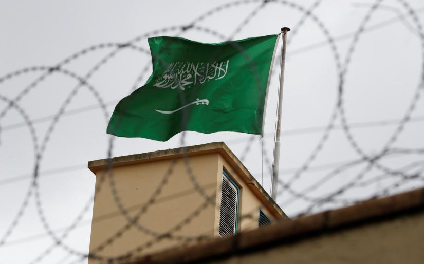 A Saudi flag flutters atop Saudi Arabia`s consulate in Istanbul, Turkey October 13, 2018. REUTERS