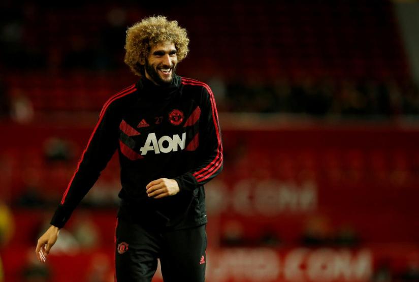 Manchester United`s Marouane Fellaini warming up before a match. REUTERS/file photo