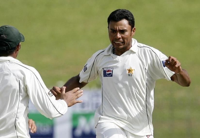 Pakistan`s Danish Kaneria celebrates taking the wicket againts Sri Lanka on the fourth day of their third test in Colombo July 23, 2009. REUTERS