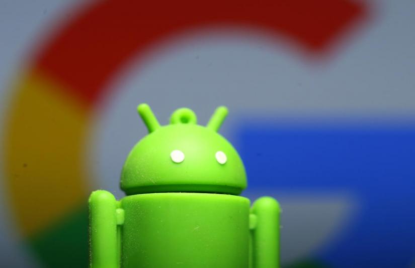 A 3D printed Android mascot Bugdroid is seen in front of a Google logo in this illustration taken July 9, 2017. REUTERS