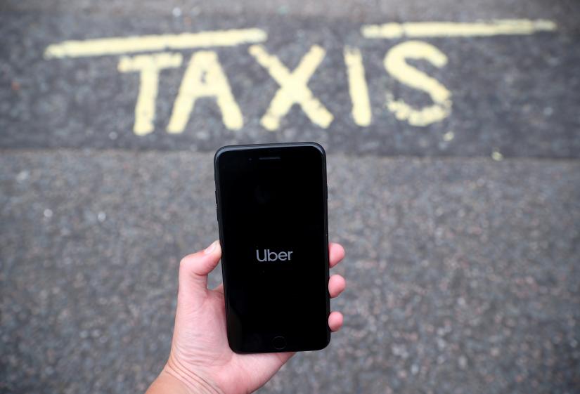The Uber application is seen on a mobile phone in London, Britain, September 14, 2018. REUTERS FILE PHOTO