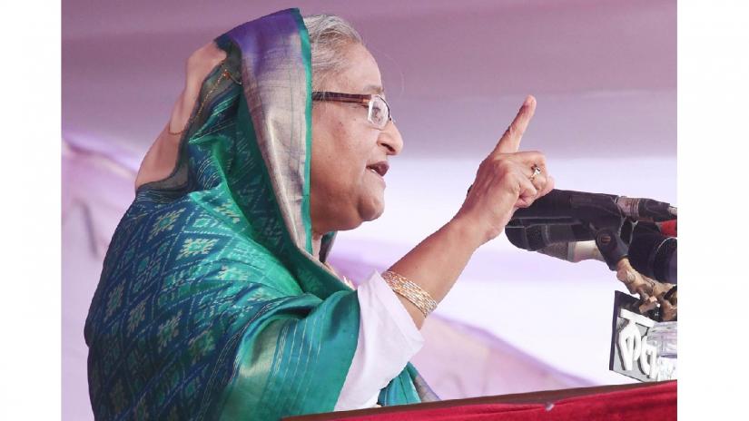 Prime Minister Shiekh Hasina addresses a public rally the Taltali Government High School grounds in the southern district of Barguna’s Taltali Upazila on Saturday (Oct 27). FOCUS BANGLA
