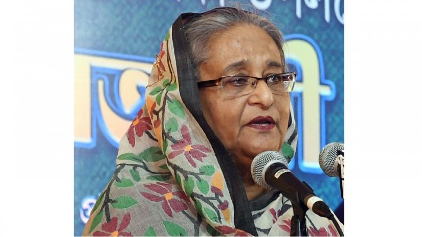 Prime Minister Sheikh Hasina speaks at a joint meeting of AL Central Working Committee, Advisory Council and Parliamentary Party at her official Ganabhaban residence on Friday (Oct 26). PID