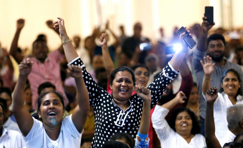 Supporters of Sri Lanka`s ousted Prime Minister Ranil Wickremesinghe (not in picture) shout inside the Prime Minister office in Colombo, Sri Lanka October 27, 2018. REUTERS