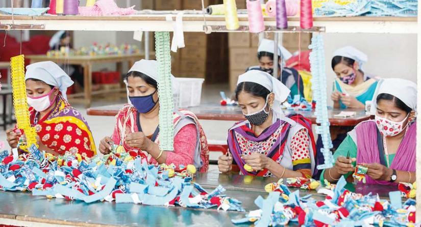 Workers at the Golden Son Ltd factory in Chittagong busy making toys that are set to be exported to the US, and European markets.