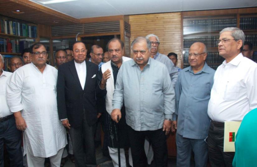 Jatiya Oikya Front leaders emerging from the offices of senior lawyer Dr Kamal Hossain at Dhaka’s Motijheel after holding Tuesday`s meeting. FOCUS BANGLA