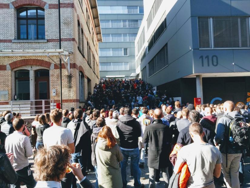 People gather next to the Google office to attend the Google Walkout in Zurich, Switzerland November 1, 2018 in this picture obtained from social media. Twitter @GOOGLEWALKOUT REUTERS