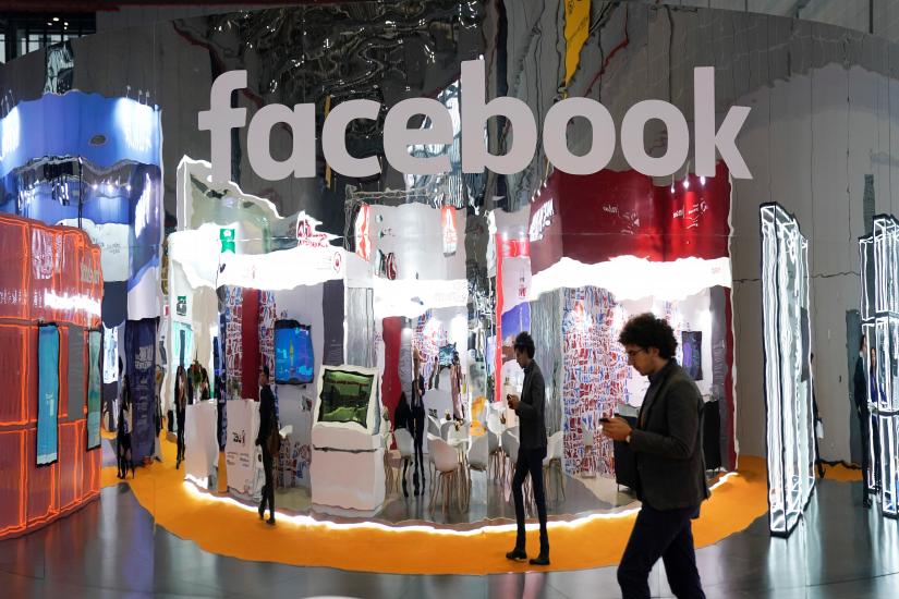 A Facebook sign is seen during the China International Import Expo (CIIE), at the National Exhibition and Convention Center in Shanghai, China November 5, 2018. REUTERS