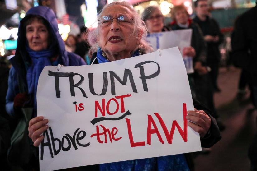 People take part in a protest to protect the investigation led by Special Counsel Robert Mueller, in New York City, US, November 8, 2018. REUTERS