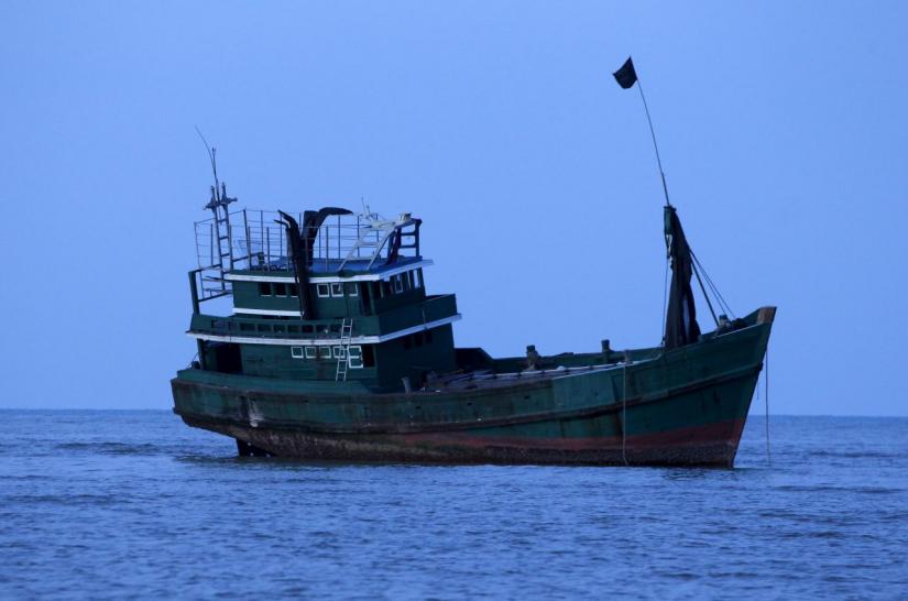 Abandoned boat which carried Rohingya and Bangladeshi migrants from Thailand is found off the coast near the city of Kuta Binje, Indonesia`s Aceh Province May 20, 2015. REUTERS/FILE PHOTO
