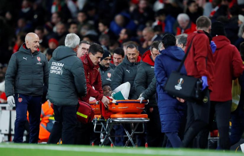 Arsenal`s Danny Welbeck leaves the pitch on a stretcher after sustaining an injury during Europa League Group Stage (Group E) match against Sporting CP, Emirates Stadium, London, Britain, Nov 8, 2018. REUTERS