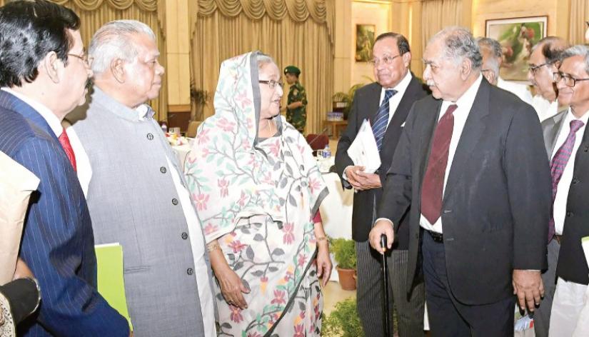 Prime minister Sheikh Hasina talks with Jaitya Oikya Front top leader Kamal Hossain before a dialogue between the ruling Awami League and JOF leaders at Ganabhaban in Dhaka on Wednesday (Nov 7). FOUCS BANGLA