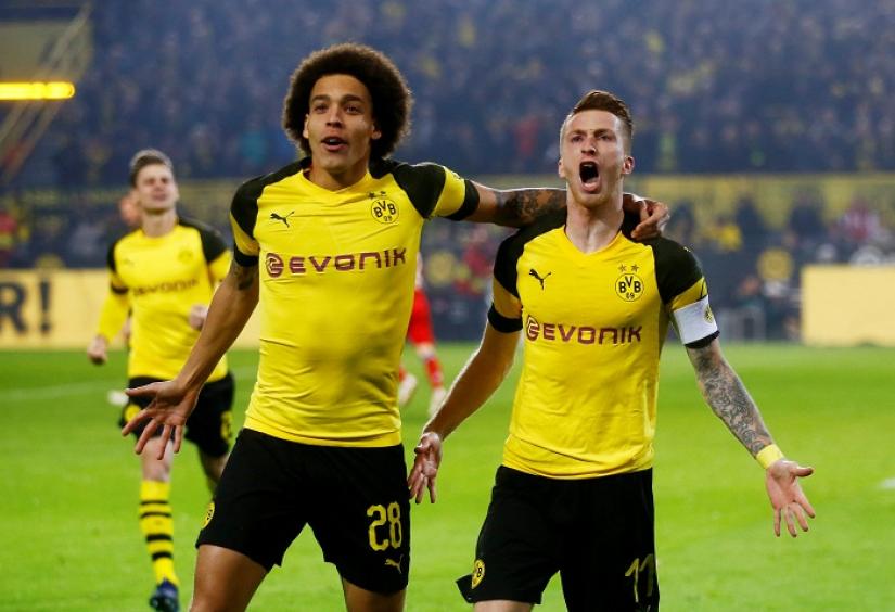 Borussia Dortmund`s Marco Reus celebrates scoring their first goal with Axel Witsel at Signal Iduna Park, Dortmund, Germany on Nov 10, 2018. REUTERS