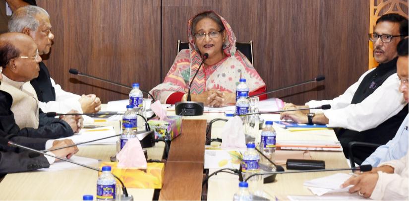 Awami League chief and Prime Minister Sheikh Hasina addressing the party`s parliamentary board meeting at the Bangabandhu Avenue headquarters on Sunday. PID
