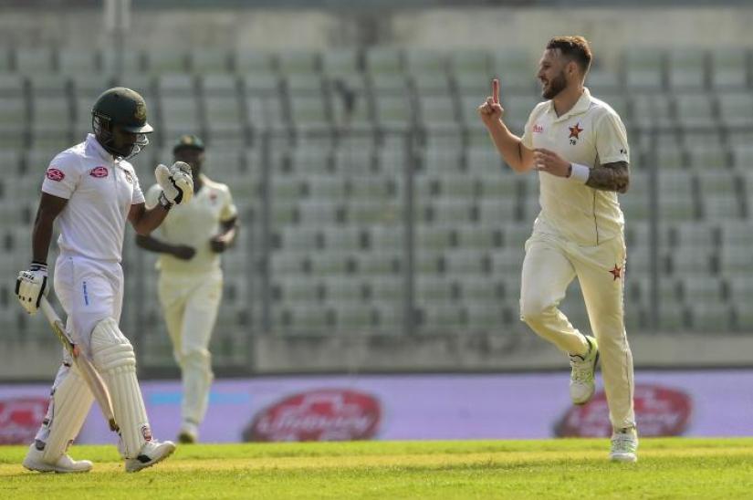 Zimbabwe’s Kyle Jarvis is celebrating after taking the wicket of Bangladesh’s Imrul Kayes in the second and final test match against Zimbabwe at Mirpur Sher-e-Bangla National Cricket Stadium in Dhaka on Sunday (Nov 11).