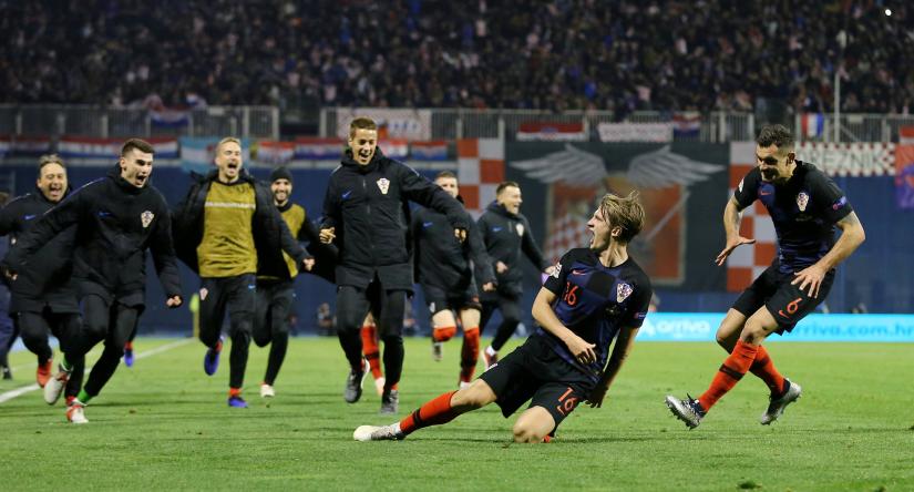 UEFA Nations League - Croatia v Spain - Stadion Maksimir, Zagreb, Croatia - November 15, 2018 Croatia`s Tin Jedvaj celebrates scoring their third goal with team mates REUTERS