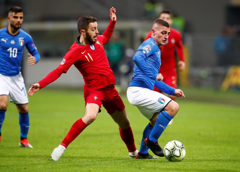 UEFA Nations League - League A - Group 3 - Italy v Portugal - San Siro, Milan, Italy - Nov 17, 2018 Italy`s Marco Verratti in action with Portugal`s Bernardo Silva REUTERS
