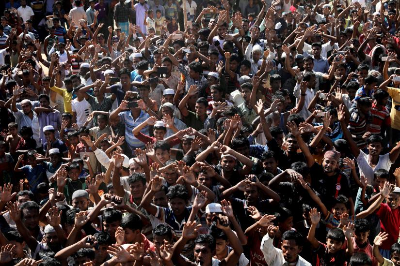 Hundreds of Rohingyas shout slogans as they protest against their repatriation at the Unchiprang camp in Teknaf, Bangladesh November 15, 2018. REUTERS/FILE PHOTO