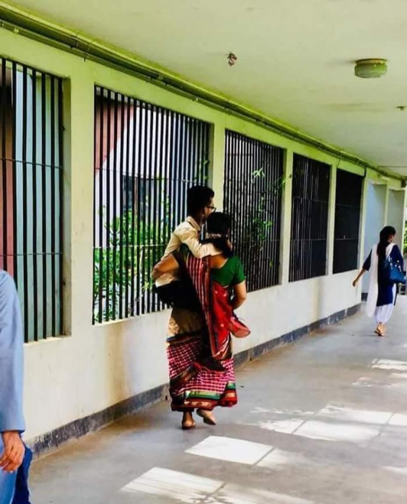 Earlier this year, the photo of 44-year-old Sima Sarkar carrying her 18-year-old son to the exam hall of the university due to lack of disabled-friendly infrastructures went viral on the social media.