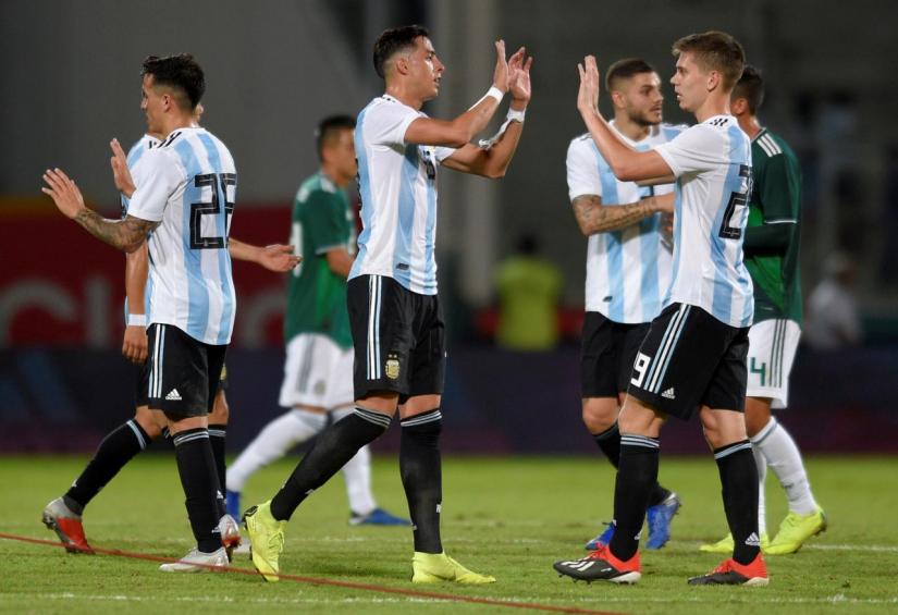 Argentina`s Ramiro Funes Mori celebrates with Juan Foyth after the match at Estadio Mario Alberto Kempes, Cordoba, Argentina on Nov 16, 2018. REUTERS