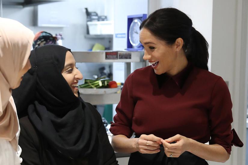 Britain's Meghan, Duchess of Sussex visits the Hubb Community Kitchen to see how funds raised by the 'Together: Our Community' cookbook are making a difference at Al Manaar, in London, Britain, November 21, 2018. REUTERS
