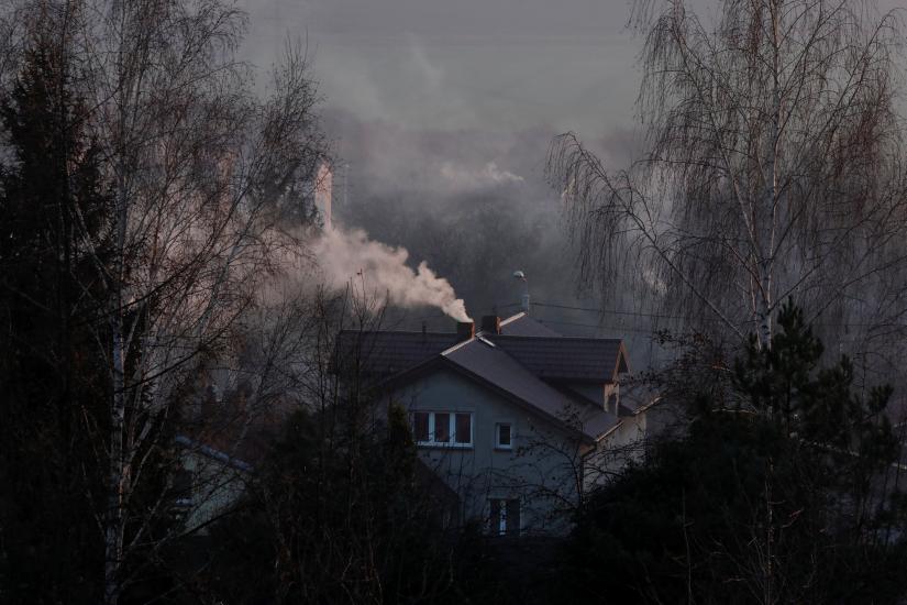 Smoke rising from a family house in Bedzin, near Katowice, Poland, December 5, 2018. REUTERS