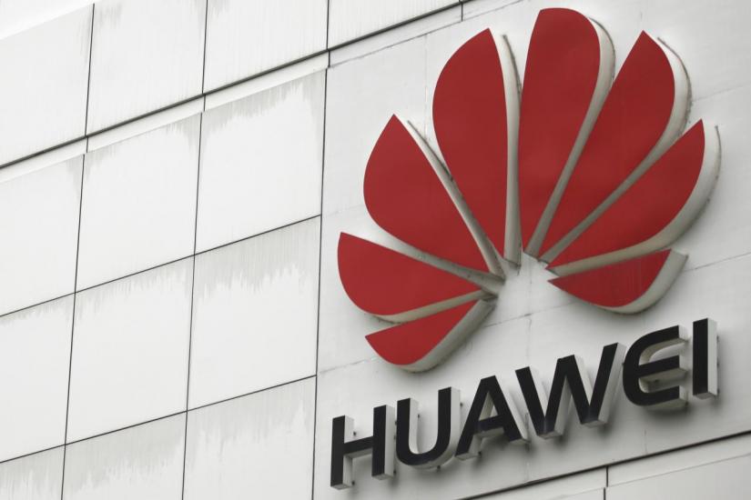 The logo of the Huawei Technologies Co. Ltd. is seen outside its headquarters in Shenzhen, Guangdong province, April 17, 2012. REUTERS/FILE PHOTO
