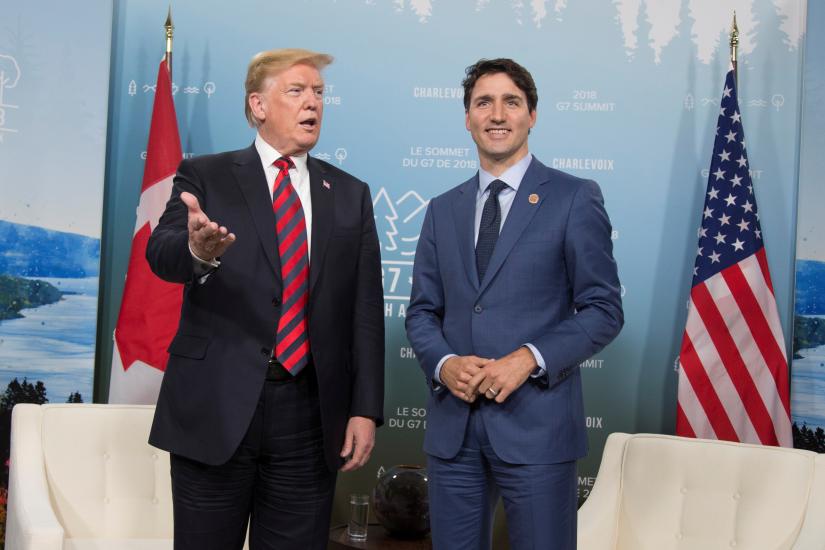 Canada`s Prime Minister Justin Trudeau (R) meets with US President Donald Trump during the G7 Summit in the Charlevoix town of La Malbaie, Quebec, Canada on Jun 8, 2018. REUTERS/FILE PHOTO