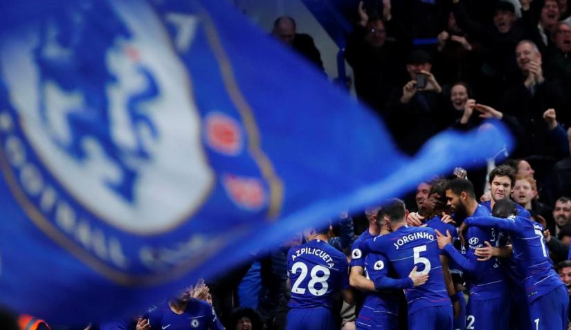 Chelsea`s David Luiz celebrates scoring their second goal with team mates against Manchester City at Stamford Bridge, London, Britain on Dec 8, 2018. REUTERS