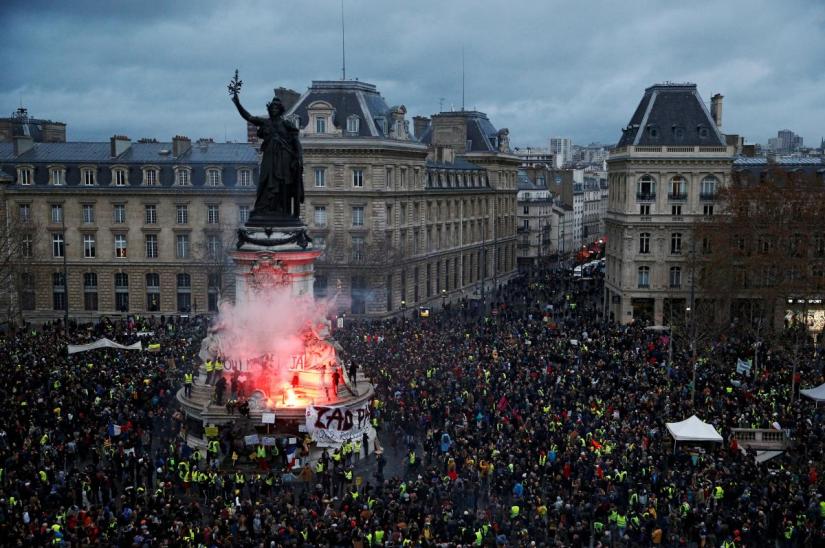 A view of the Place de la Republique as protesters wearing yellow vests gather during a national day of protest by the `yellow vests` movement in Paris, France, December 8, 2018. REUTERS