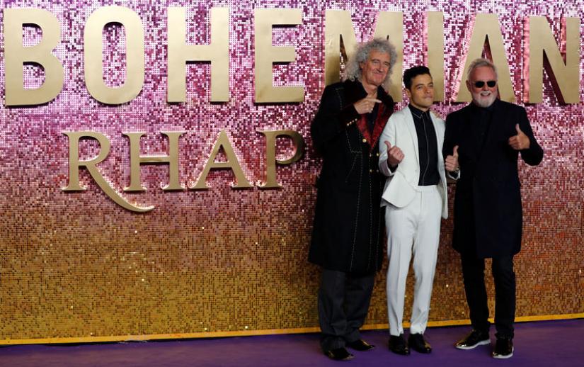 Actor Rami Malek and members of Queen Roger Taylor and Brian May attend the world premiere of `Bohemian Rhapsody` movie in London, Britain October 23, 2018. REUTERS