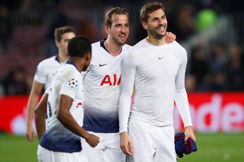 Tottenham`s Harry Kane celebrates with Fernando Llorente after the match against FC Barcelona at at Camp Nou stadium in Barcelona, Spain on Dec 11, 2018. REUTERS