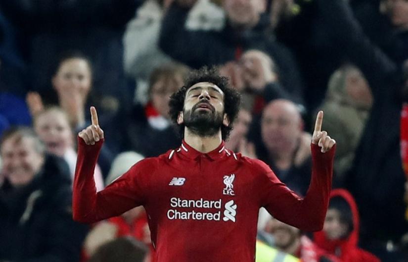 Liverpool`s Mohamed Salah celebrates scoring their first goal against Napoli at Anfield, Liverpool, Britain on Dec 11, 2018. REUTERS