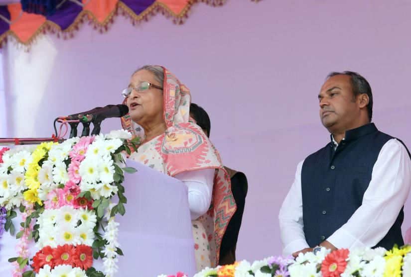 Awami League President and Prime Minister Sheikh Hasina addresses a rally in Manikganj`s Paturia on Thursday (Dec 13). PID