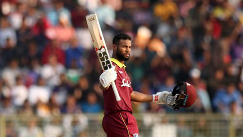 The West Indies` Shai Hope raises his bat after reaching his hundred during their third ODI against Bangladesh in Sylhet on Friday (Dec 14). PHOTO: Md Manik